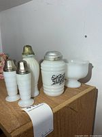 Group shot: sugar jar, three shakers, pedestal bowl