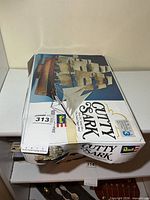 Top view of Revell Cutty Sark model kit box, visible crushed corner and open end