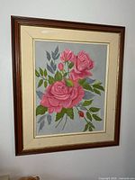 Full view of framed floral oil painting