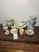 Group shot of all eight ceramic items on shelf