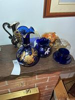 Group shot shows all items on mantle