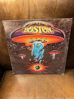Front jacket showing Boston spaceship artwork