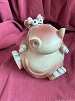 Front view of resin hippo piggy bank