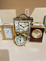 All four clocks grouped together