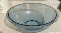 Top view of blue Pyrex mixing bowl showing interior and rim
