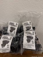 Front view of four sealed Ruby Space Triangles 18-packs