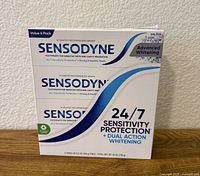 Front of sealed Sensodyne Advanced Whitening 4-pack showing branding and quantity
