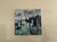 Front view of square mini canvas showing San Francisco collage design