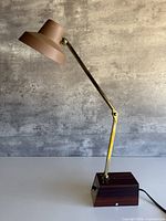 Lamp standing upright showing full profile