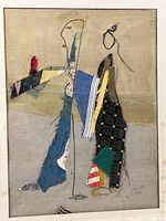 Full view of framed textile collage with abstract figures