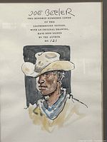 Close-up of artwork showing drawing, signature, edition text