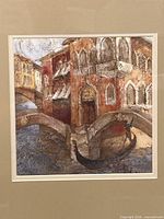 Close view of print showing gondola, bridges and Venetian buildings