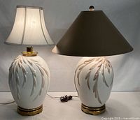 both ceramic lamps with different shades displayed side by side