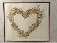 Full view of "Country Wreath" etching showing heart-shaped vine wreath with flowers and visible title, number and signature