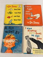 All four hardcover Beginner Books laid out showing front covers