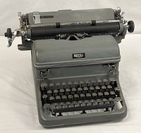 Front view of Royal KMM typewriter showing keyboard and logo