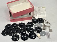 Full set showing cams, accessories, box and instructions