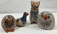 Group shot of four Tonala burnished pottery animal figurines