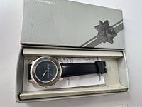 Watch in presentation box showing overall condition and accessories