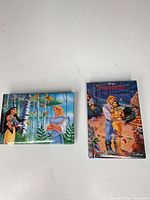Both Pocahontas pin cards front view