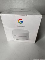 Front view of sealed Google Wifi retail box