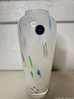 Front view showing frosted body, multicolour flecks and maker’s label