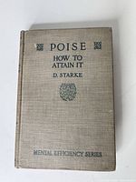 Front cover of book showing title and condition