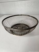 Top view of round silver wire fruit bowl