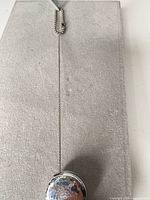 Tape measure extended on display board