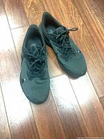 Top view of both shoes showing mesh uppers and laces