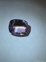 Cushion-cut amethyst front view showing colour and facets