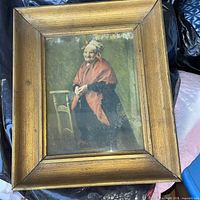 Front view of framed print showing artwork and full wood frame