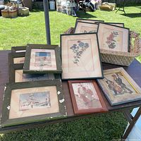 Overview of all framed prints on table