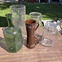 Group view of all glass items and mugs on tabletop