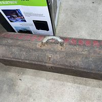 Exterior of long metal toolbox, closed
