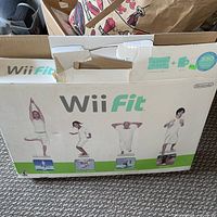 Front of Wii Fit box showing branding and exercise graphics