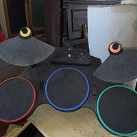 Front view of drum kit showing pads and cymbals
