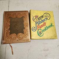 Front view of both cookbooks closed