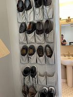Organizer holding multiple pairs of men’s shoes