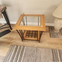 Full view of table showing glass top and materials