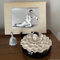 Overall lot showing trinket box, print on stand, small bell figurine