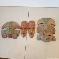 full set of four masks laid out side by side