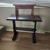 2-step stool with small bench placed on top
