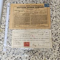 Fronts of Bank of Amherst check and Southern Express Company receipt