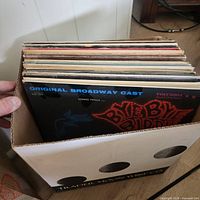 Box showing stack of vinyl LP records with Bye Bye Birdie album on top
