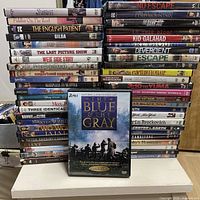 Full view of two large DVD stacks plus front-facing miniseries showing variety and volume