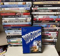 Overall view of stacked DVD cases with Back to the Future box displayed