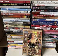 Two tall stacks of DVD cases and one box set displayed