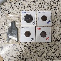 Overall lot: four US coins in flips plus Chinese spade money