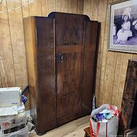 Full front view of wood Art Deco wardrobe armoire